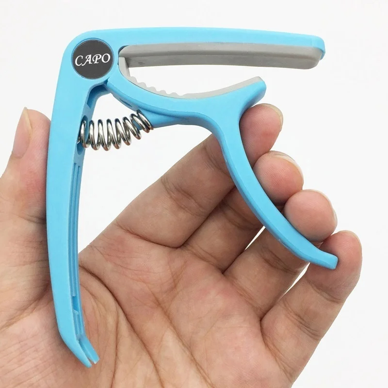 Plastic Guitar Capo for 6 Stri - Musical Instrument Names recension och pris