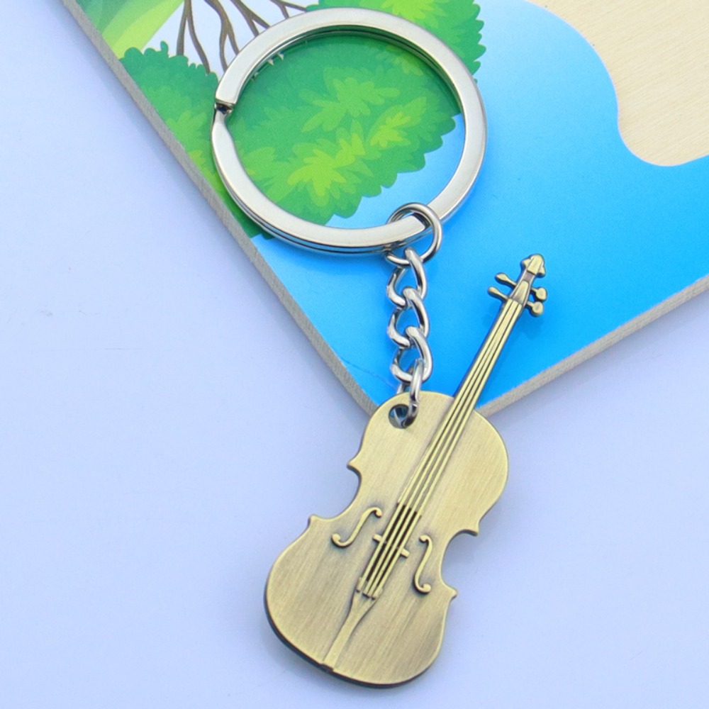 Cool Metal Guitar Key Chain Cl - Musical Instruments Cartoon recension och pris