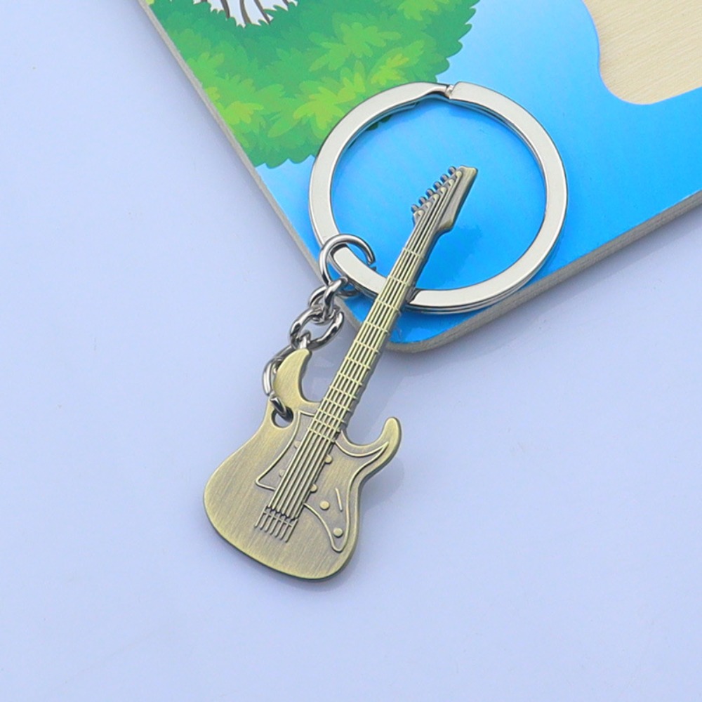 Cool Metal Guitar Key Chain Cl - Musical Instruments Cartoon recension och pris